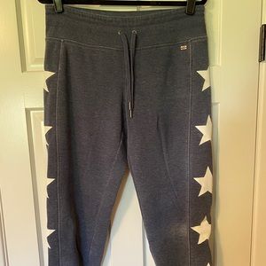 Blue joggers with stars on side